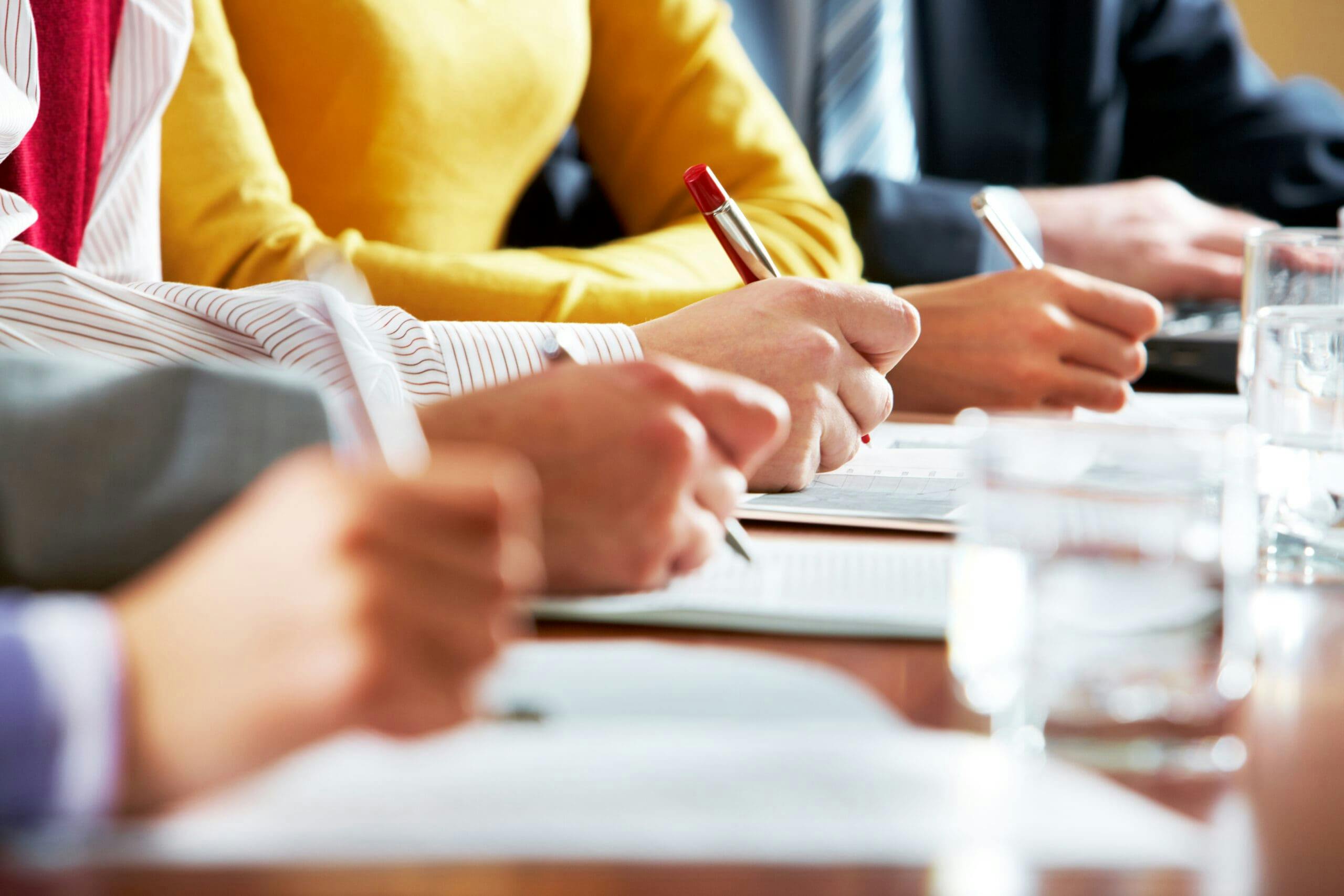 stock image hands writing notes